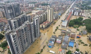 China Issues Highest-Level Rainstorm Warning as Floods Displace Thousands