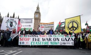 solidarity with Gaza, London, massive rally, Stop arming Israel, Israeli attacks, Gaza Strip, Palestinian flags, humanitarian crisis, Free Palestine, Stop the genocide,